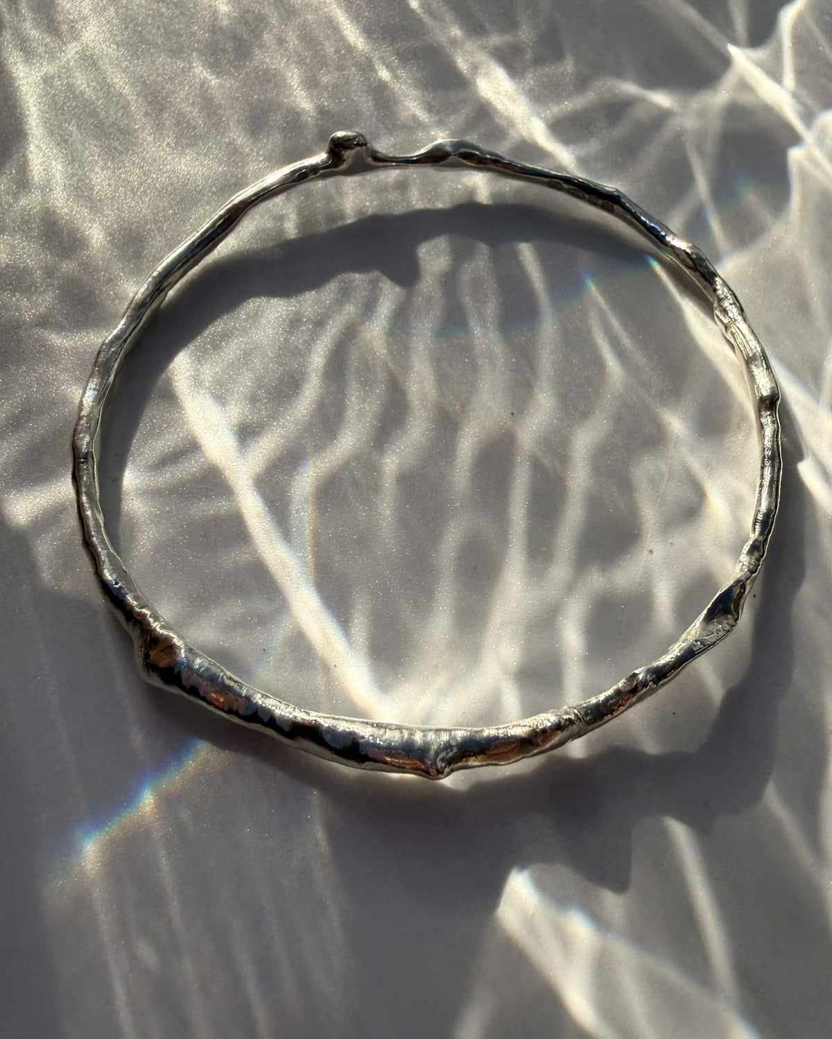 Rippling Caustics Solid Sterling Silver Bangle Bangle Rippling Caustics Solid Sterling Silver Bangle Emma Nixon Jewellery