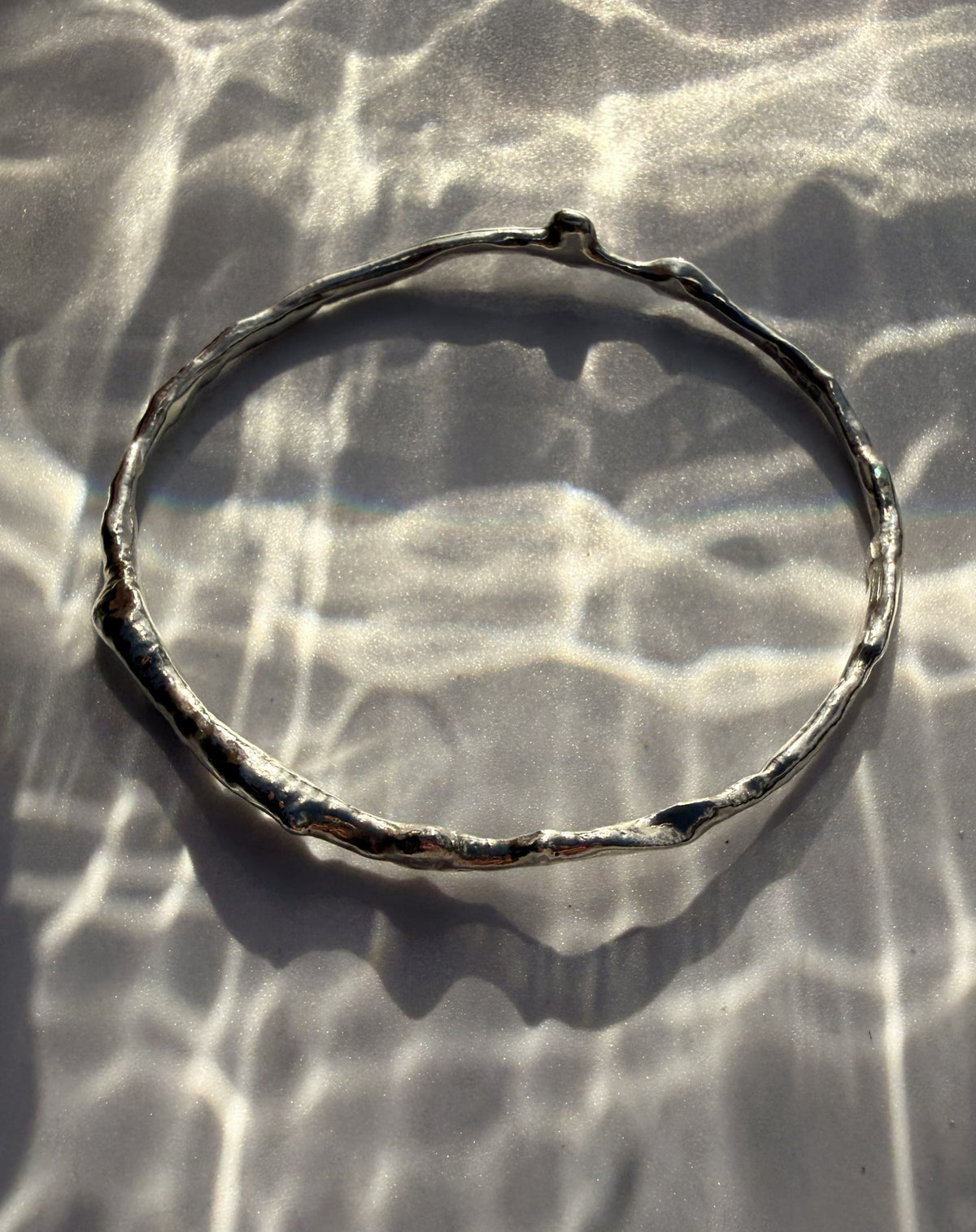 Rippling Caustics Solid Sterling Silver Bangle Bangle Rippling Caustics Solid Sterling Silver Bangle Emma Nixon Jewellery